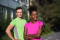 Portrait of young multietnic jogging couple ready to run