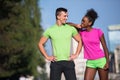 Portrait of young multietnic jogging couple ready to run