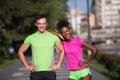 Portrait of young multietnic jogging couple ready to run