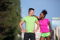 Portrait of young multietnic jogging couple ready to run