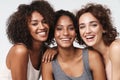 Portrait of young multiracial women standing together and smiling Royalty Free Stock Photo