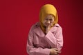 Portrait of young muslim teenage girl wearing red hijab suffer from toothache Royalty Free Stock Photo