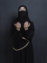 Portrait of young Muslim woman with niqab making dua Royalty Free Stock Photo