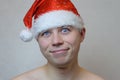 Portrait of young naked man with Santa hat Royalty Free Stock Photo