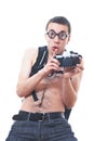 Portrait of a young nerd with old fashioned camera Royalty Free Stock Photo
