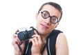 Portrait of a young nerd with old fashioned camera Royalty Free Stock Photo