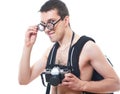 Portrait of a young nerd with old fashioned camera Royalty Free Stock Photo