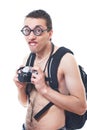 Portrait of a young nerd with old fashioned camera Royalty Free Stock Photo