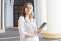 Portrait of a young nurse, medical university student girl stands with phonendoscope and documents, happy female doctor in uniform Royalty Free Stock Photo