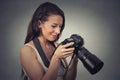 Portrait young photographer using reflex camera Royalty Free Stock Photo