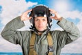 Portrait of young pilot wearing helmet with a sky Royalty Free Stock Photo