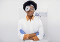 Portrait of young pleasant African American woman, confident ENT otolaryngologist doctor, wearing white lab coat, head Royalty Free Stock Photo