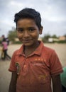 Portrait of young poor smiling boy in India Royalty Free Stock Photo