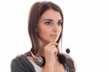 Portrait of young pretty call center worker girl with headphones and microphone looking away isolated on white Royalty Free Stock Photo