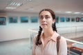 Portrait of young pretty caucasian woman contemplating at the artwork. Exhibition in the art gallery. Excursion and Royalty Free Stock Photo