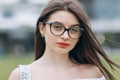 Portrait of young professional woman wearing glasses. Closeup portrait of beautiful happy Caucasian female model. Royalty Free Stock Photo