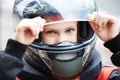 Portrait of a young racer in helmet