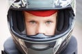 Portrait of young racer in helmet