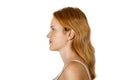 Portrait of a young red-haired woman in profile Royalty Free Stock Photo