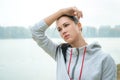 Portrait of a young sad woman with headache, fatigue or cold. D Royalty Free Stock Photo