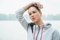 Portrait of a young sad woman with headache, fatigue or cold. D Royalty Free Stock Photo