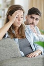 portrait young sad woman sitting back to husband Royalty Free Stock Photo