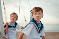 Portrait of young sailors near yacht Royalty Free Stock Photo