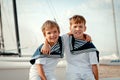 Portrait of young sailors near yacht Royalty Free Stock Photo