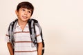 Portrait of young schoolboy looking away