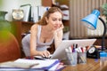 Portrait of a young sexy woman business manager working at a computer Royalty Free Stock Photo