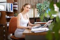 Portrait of a young sexy woman business manager working at a computer Royalty Free Stock Photo