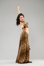 Portrait of the young woman in leopard skirt Royalty Free Stock Photo