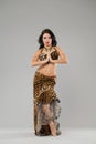 Portrait of the young woman in leopard skirt Royalty Free Stock Photo