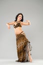 Portrait of the young woman in leopard skirt Royalty Free Stock Photo