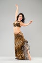 Portrait of the young woman in leopard skirt Royalty Free Stock Photo