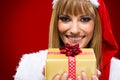 Portrait of young, woman Santa with gift boxes Royalty Free Stock Photo