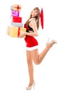 Portrait of young, woman Santa with gift boxes Royalty Free Stock Photo