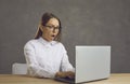 Portrait of young shocked astonished businesswoman woman working on laptop Royalty Free Stock Photo