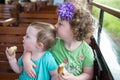 Portrait of young sibling girls riding on train Royalty Free Stock Photo