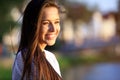 Portrait Of Young Smiling Beautiful Woman. Close-up portrait of a fresh and beautiful young fashion model posing outdoor Royalty Free Stock Photo