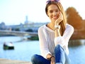 Portrait Of Young Smiling Beautiful Woman. Close-up portrait of a fresh and beautiful young fashion model posing outdoor Royalty Free Stock Photo