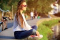 Portrait Of Young Smiling Beautiful Woman. Close-up portrait of a fresh and beautiful young fashion model posing outdoor Royalty Free Stock Photo