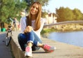 Portrait Of Young Smiling Beautiful Woman. Close-up portrait of a fresh and beautiful young fashion model posing outdoor Royalty Free Stock Photo