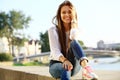 Portrait Of Young Smiling Beautiful Woman. Close-up portrait of a fresh and beautiful young fashion model posing outdoor Royalty Free Stock Photo