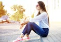 Portrait Of Young Smiling Beautiful Woman. Close-up portrait of a fresh and beautiful young fashion model posing outdoor Royalty Free Stock Photo