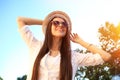 Portrait Of Young Smiling Beautiful Woman. Close-up portrait of a fresh and beautiful young fashion model posing outdoor Royalty Free Stock Photo