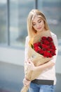 Portrait Of Young Smiling Beautiful Woman with flowers