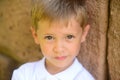 Portrait of young smiling boy in outdoors Royalty Free Stock Photo