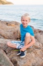 Portrait of young smiling boy at the sea Royalty Free Stock Photo