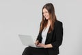 Portrait of young smiling brunette woman lady in business suit w Royalty Free Stock Photo